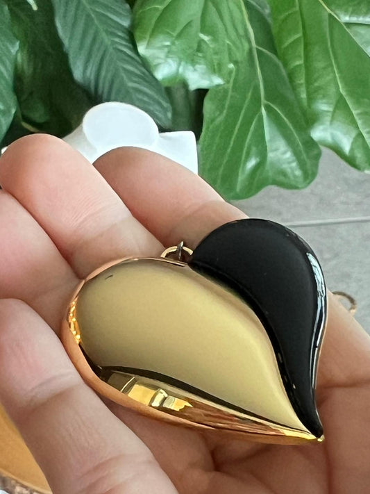 gold and black heart pendant